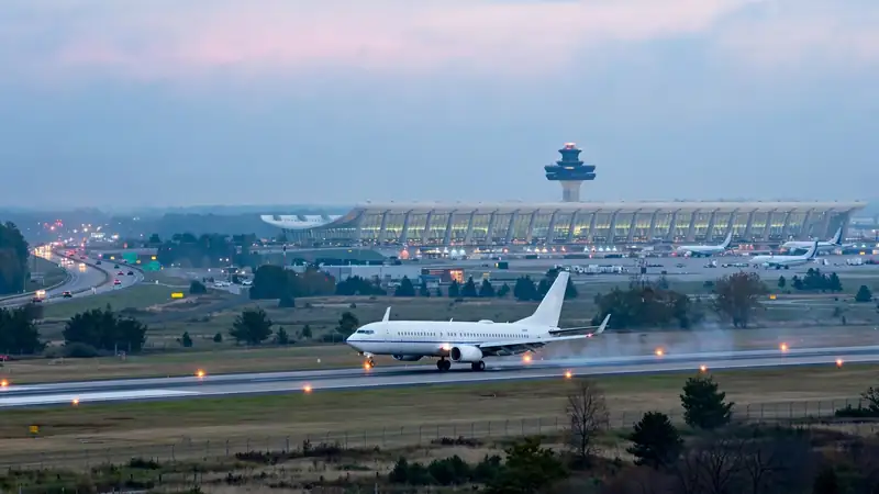 Airplane landing at Dulles airport with haze